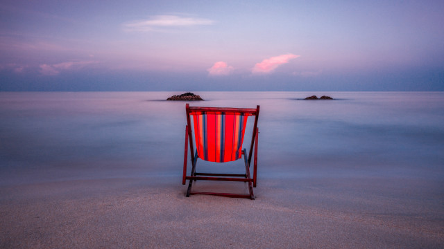 Red white chair sandy beach free wallpaper - medium preview image