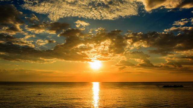 Sunset ocean boat clouds cityscape free wallpaper - medium preview image