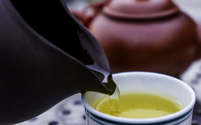 Pouring green tea cup teapot free wallpaper - medium preview image
