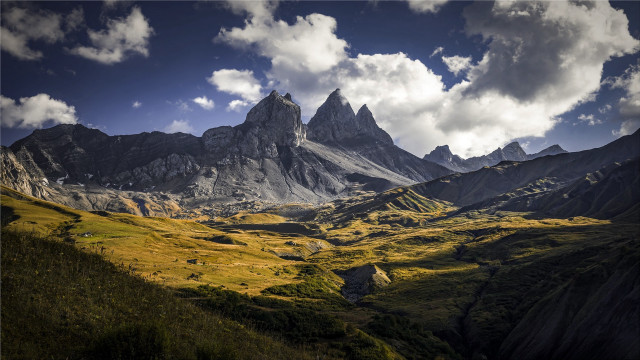 Mountain range clouds grassy valley free wallpaper - medium preview image