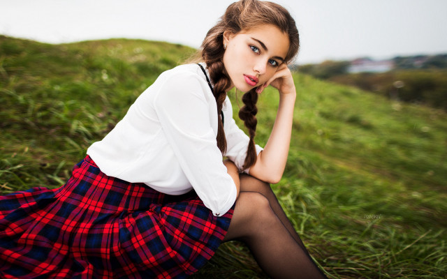 Woman sitting hill bush plaid free wallpaper - medium preview image