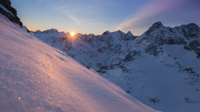 Snowboarder sunset mountains lake cityscape free wallpaper - medium preview image