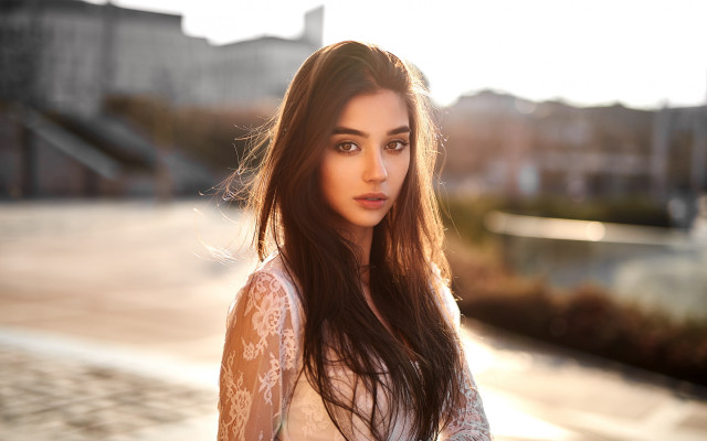 Woman long hair city sidewalk free wallpaper - medium preview image