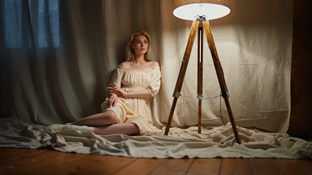 Woman sitting bed lamp curtain free wallpaper - medium preview image