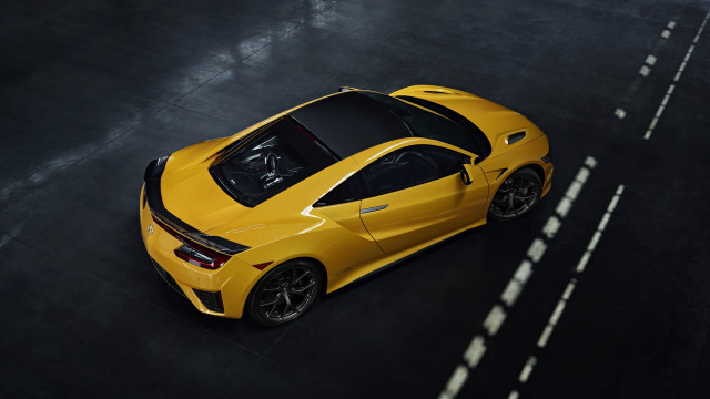 Yellow sports car black floor free wallpaper - medium preview image