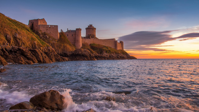 Castle cliff ocean sunset waves free wallpaper - medium preview image