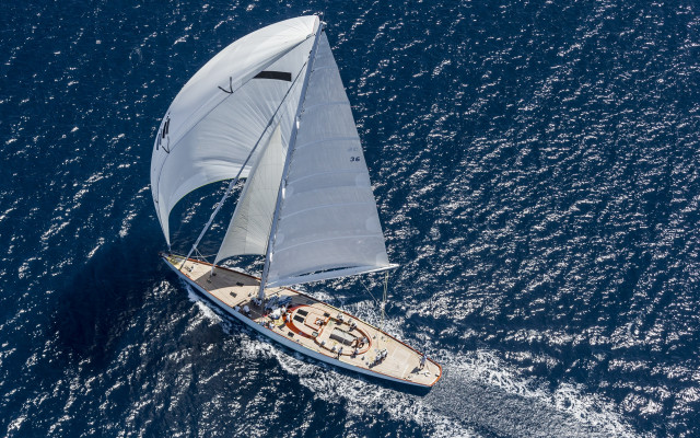 Sailboat ocean sunny day white free wallpaper - medium preview image