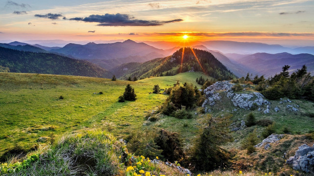 Sunset mountain range grassy field #2 free wallpaper - medium preview image