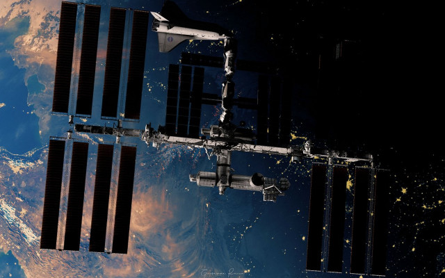 Space station earth lights satellite free wallpaper - medium preview image