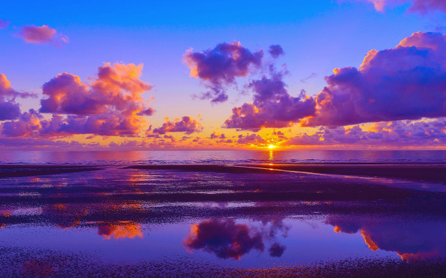 Sunset clouds reflecting water plane free wallpaper - medium preview image
