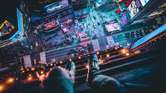 Person ledge looking city night free wallpaper - medium preview image