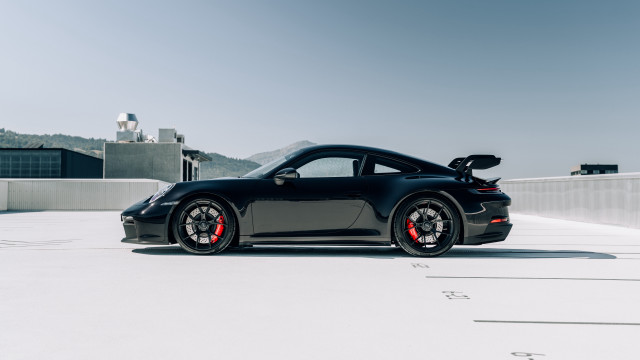 Black sports car parking lot #25 free wallpaper - medium preview image