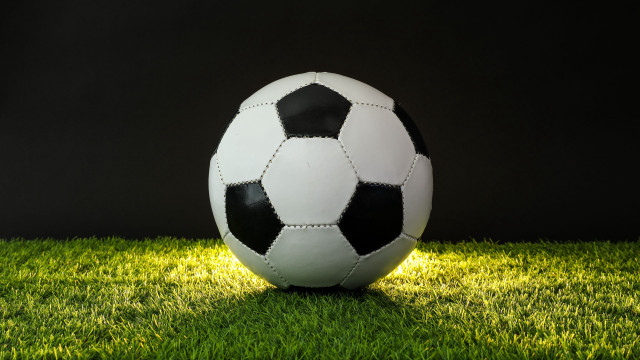Soccer ball bronze sculpture green free wallpaper - medium preview image