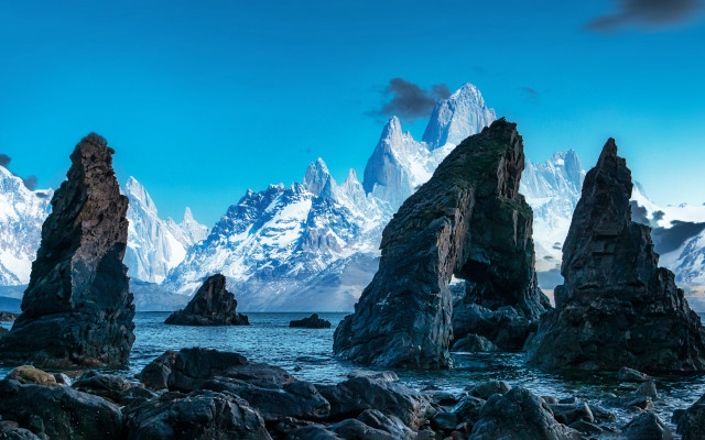 Beach rocks mountains sky water free wallpaper - medium preview image
