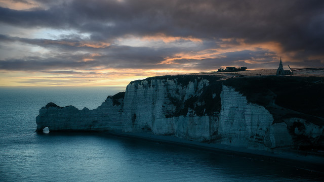 Cliff tower ocean cloudy sky free wallpaper - medium preview image