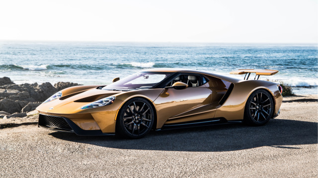 Gold sports car beach ocean free wallpaper - medium preview image