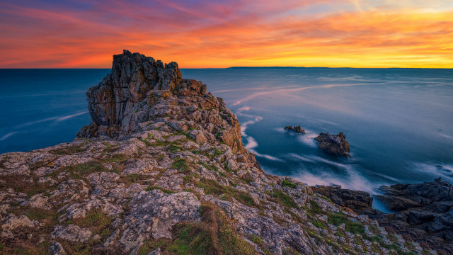 Rocky cliff water sunset bridge free wallpaper - medium preview image