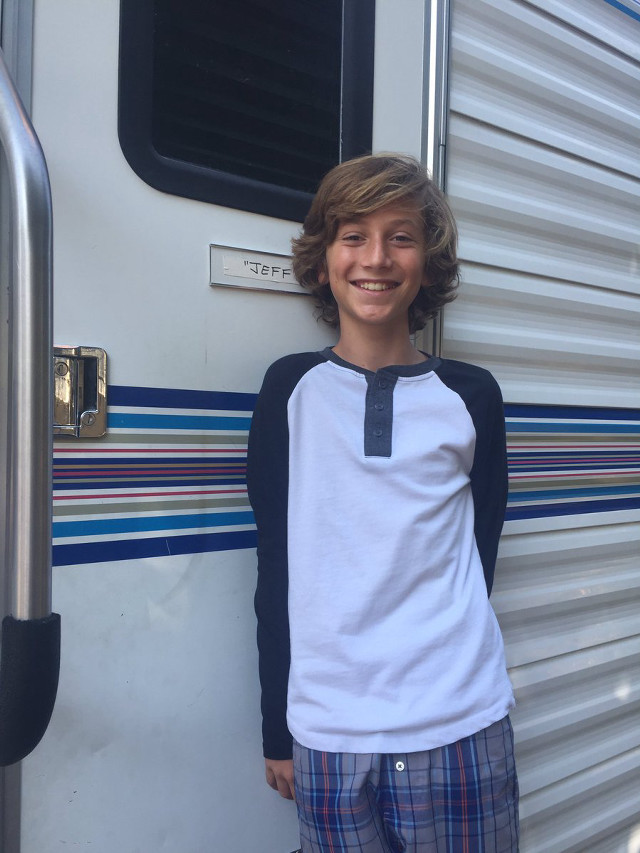 Boy smiling trailer bun plaid free wallpaper - medium preview image