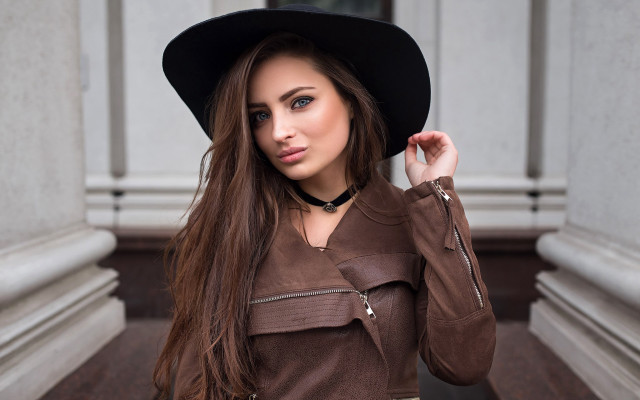 Woman brownjacket blackhat portrait bookshelf free wallpaper - medium preview image