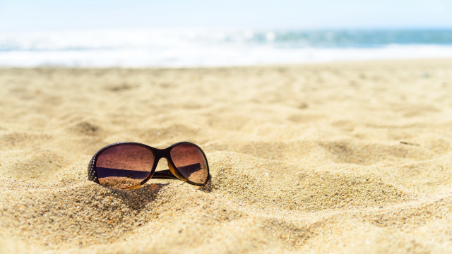Sunglasses beach sand ocean sunny free wallpaper - medium preview image