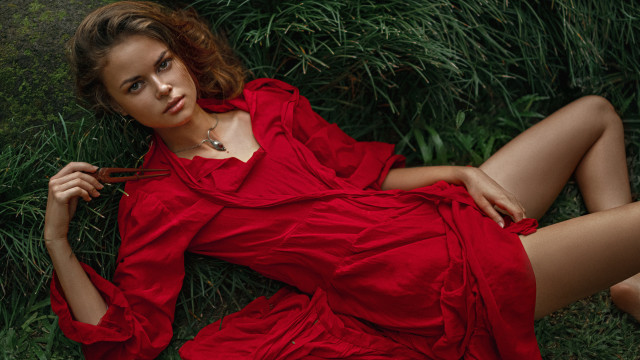 Woman red dress lying nature #2 free wallpaper - medium preview image