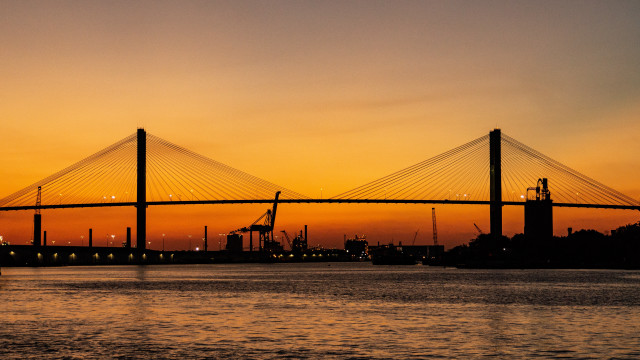 Bridge water sunset boat cityscape free wallpaper - medium preview image