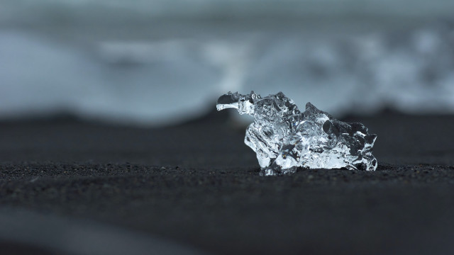Ice black sand beach ocean free wallpaper - medium preview image