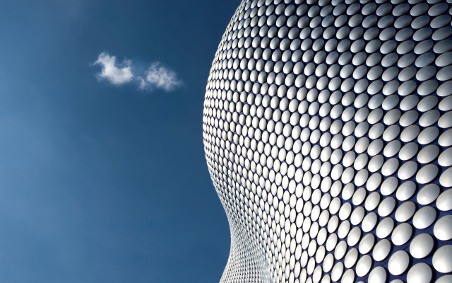 Building white circles blue sky free wallpaper - medium preview image