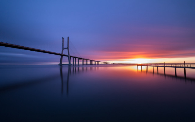 Sunset bridge water orange sky free wallpaper - medium preview image