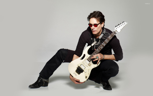 Man sunglasses guitar posing picture free wallpaper - medium preview image