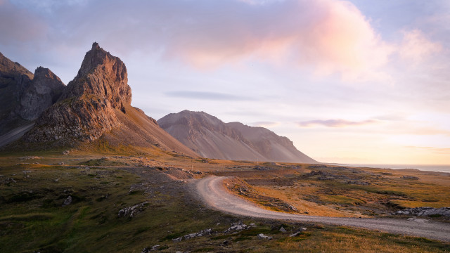 Dirt road grassy field mountain free wallpaper - medium preview image