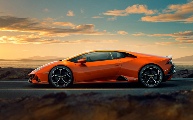 Orange sports car ocean sunset free wallpaper - medium preview image