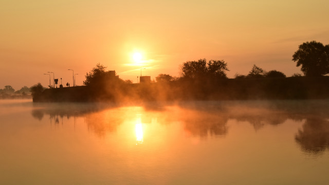 Foggy lake sunset trees building free wallpaper - medium preview image