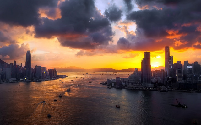 Sunset city boats cloudy sky free wallpaper - medium preview image