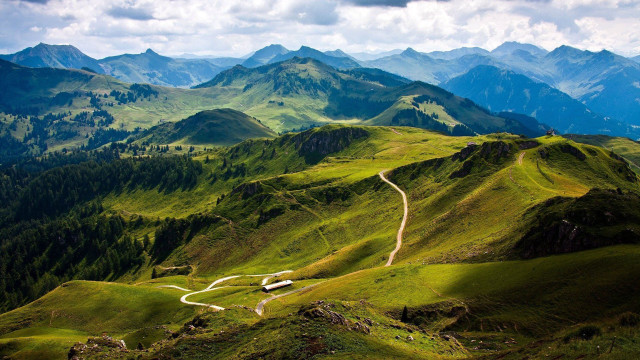 Winding road green mountains clouds free wallpaper - medium preview image