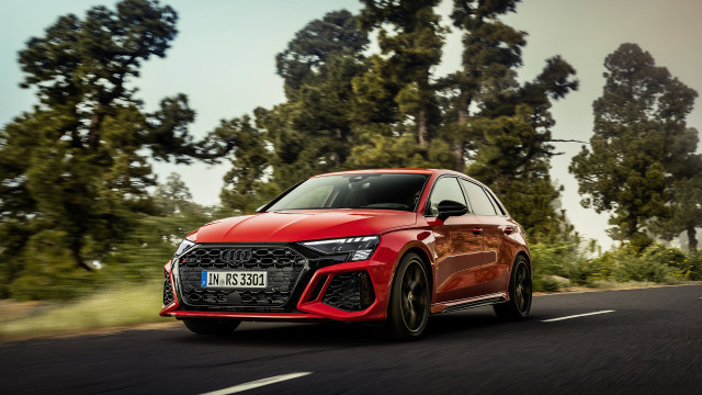 Red car driving road trees free wallpaper - medium preview image