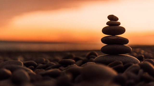Stack rocks field sunset sky free wallpaper - medium preview image