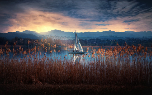 Sailboat lake mountains cityscape sunset free wallpaper - medium preview image