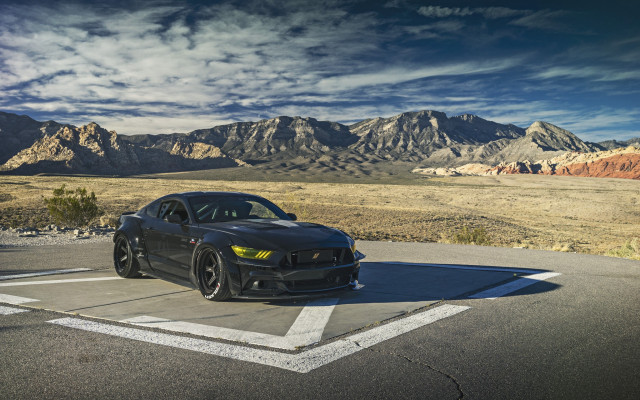 Black sports car mountains clouds free wallpaper - medium preview image