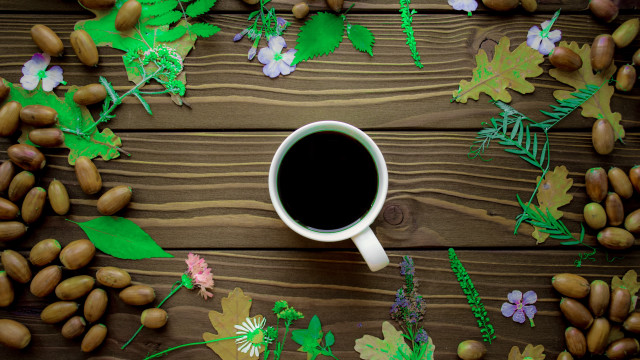 Coffee leaves nuts wooden table free wallpaper - medium preview image