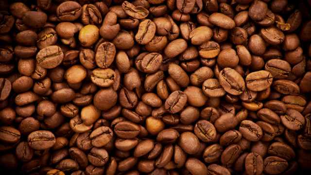 Coffee beans pile brown background free wallpaper - medium preview image