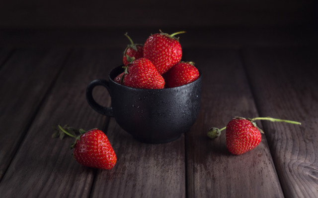 Black cup strawberries wooden table free wallpaper - medium preview image