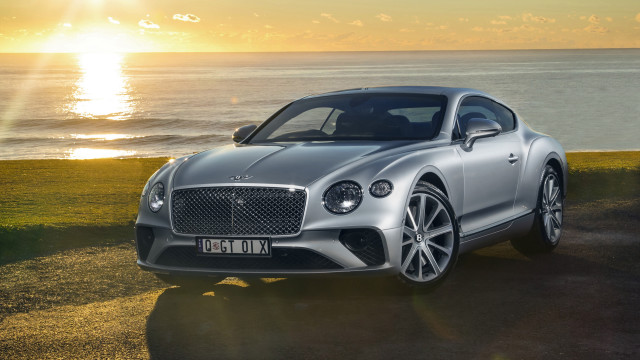 Silver sports car beach sunset free wallpaper - medium preview image
