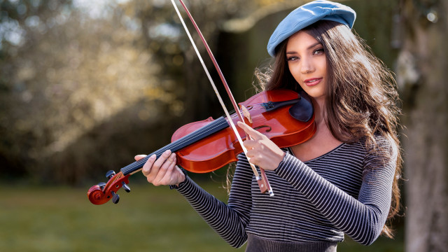 Woman blue hat violin outside free wallpaper - medium preview image