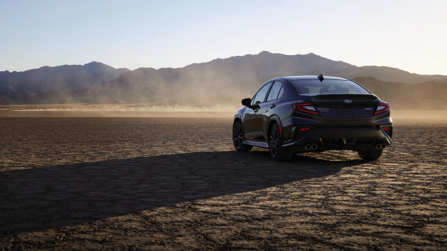 Desert car mountains dust tiltshift free wallpaper - medium preview image