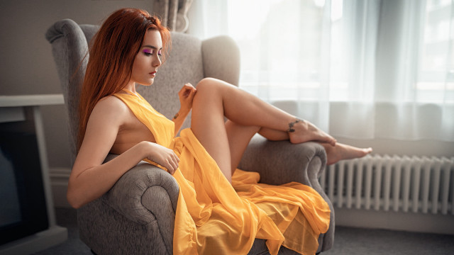 Woman yellow dress sitting chair free wallpaper - medium preview image