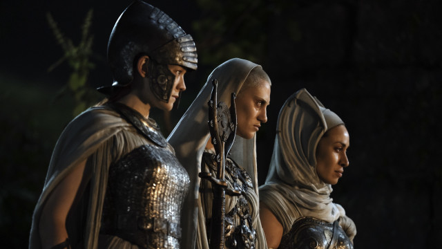 Three costumed people dark room free wallpaper - medium preview image