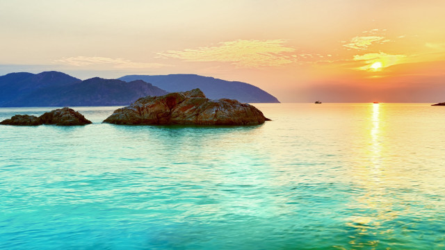 Sunset water mountains boat sky free wallpaper - medium preview image