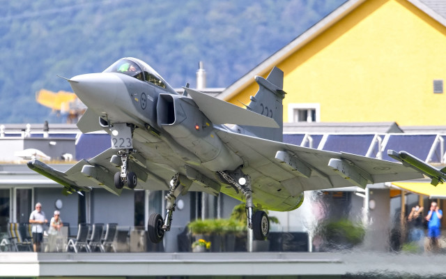 Jet takeoff people yellowbuilding arabesque free wallpaper - medium preview image