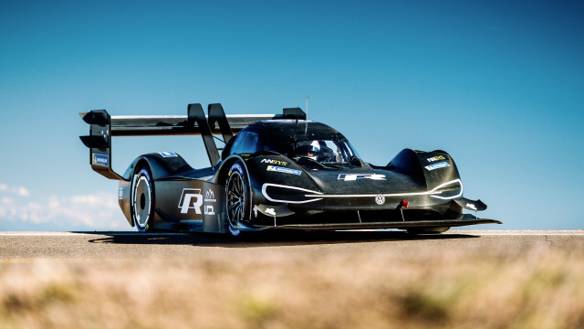 Black race car road sky free wallpaper - medium preview image